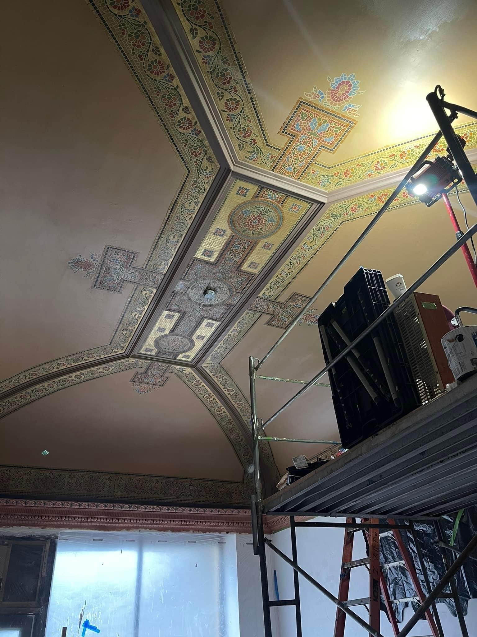 picture of restoration of painting on a ceiling at Capital Theatre